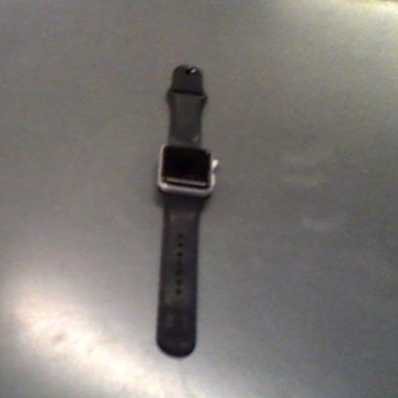 apple watch series 3 with black band.